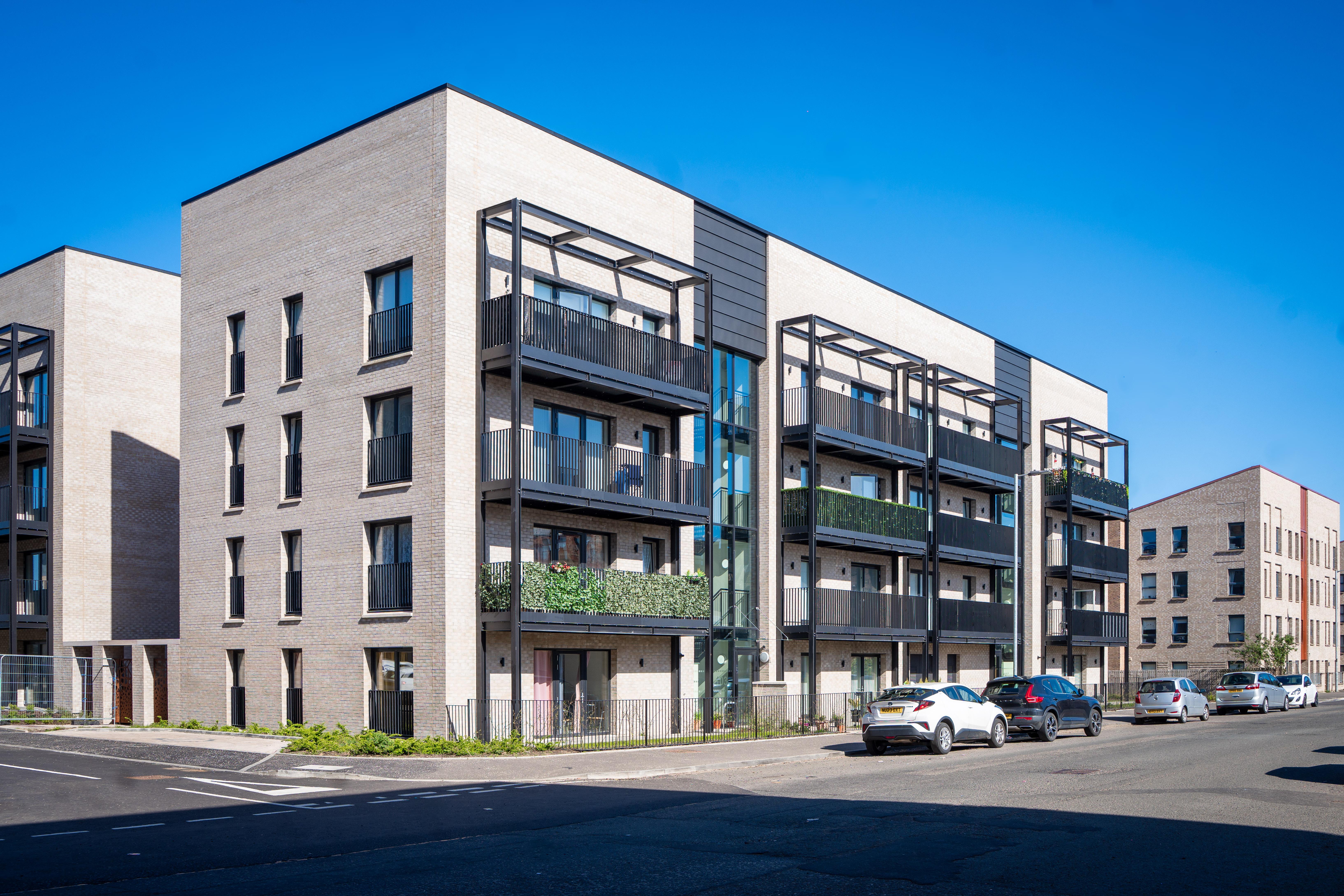 Butterbiggins Road new build flats sunny day