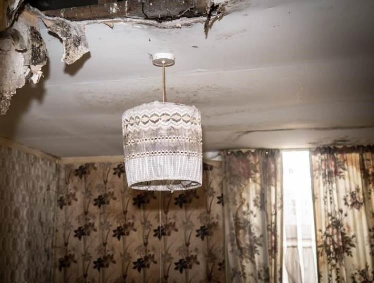Ceiling and light fitting in bad condition